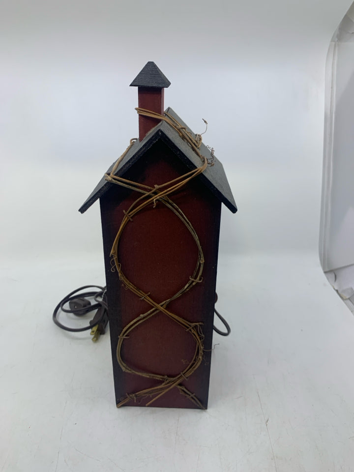 MAROON PRIMITIVE STYLE HOUSE W/ VINES/STARS.