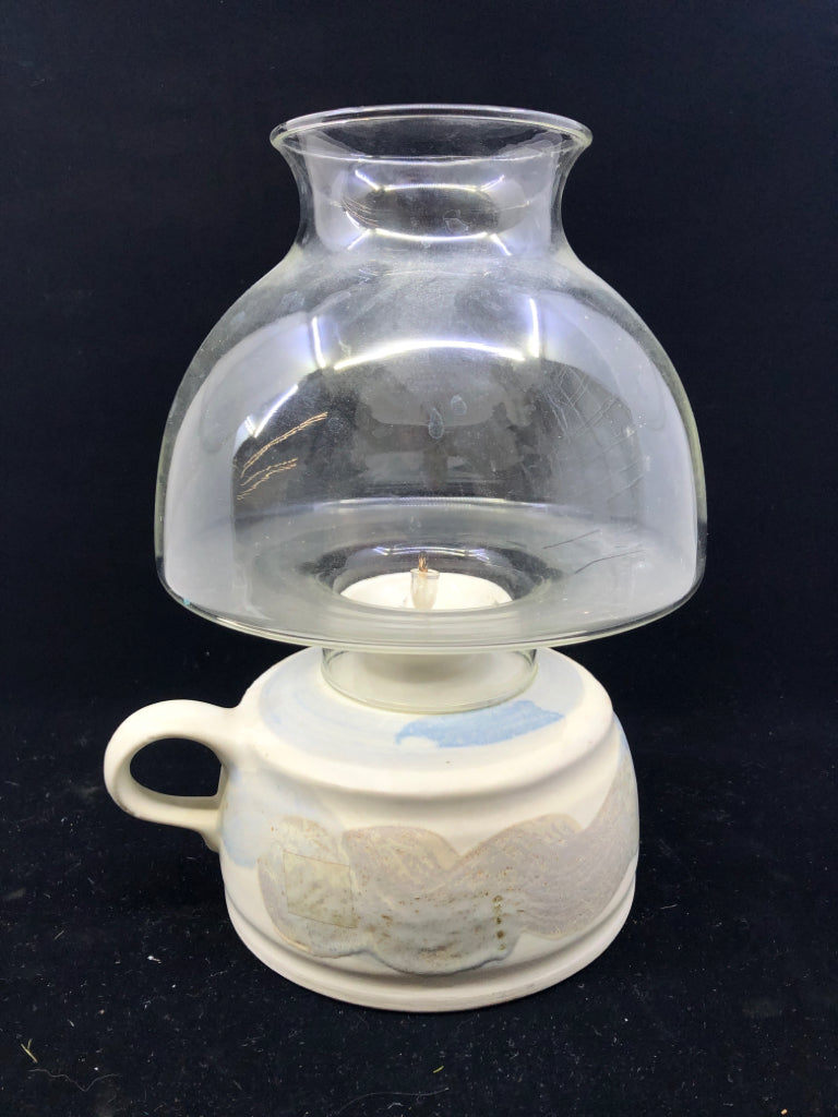 CREAM W GREY AND BLUE POTTERY OIL LAMP.