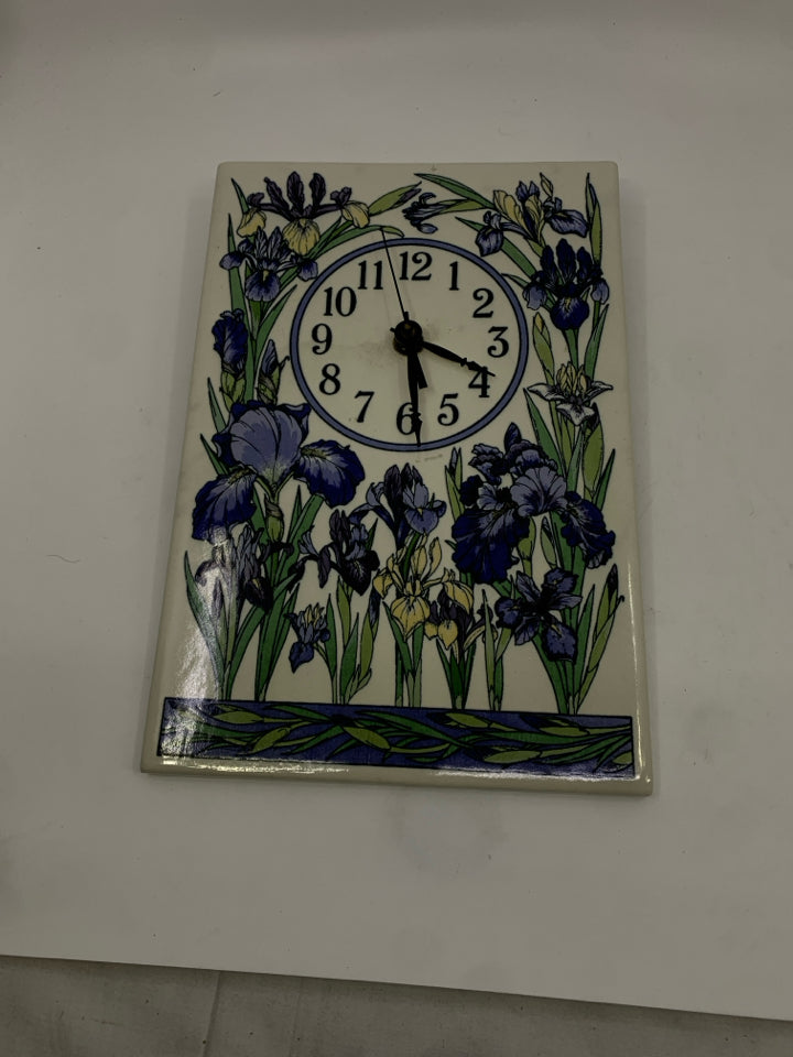 CLOCK W/IRISES.