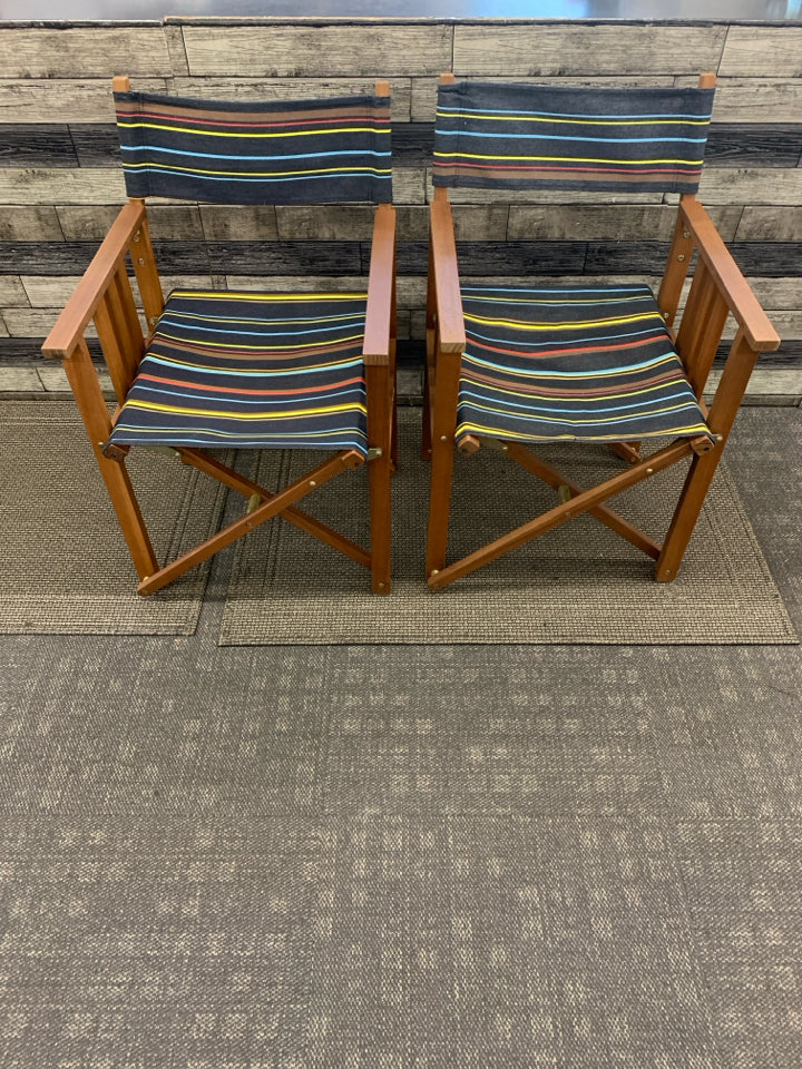 2 FOLD UP DIRECTOR CHAIRS DARK BROWN W/ COLORFUL STRIPE PATTERN.