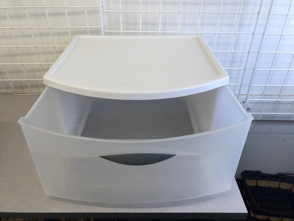 WHITE PLASTIC STORAGE DRAWER.