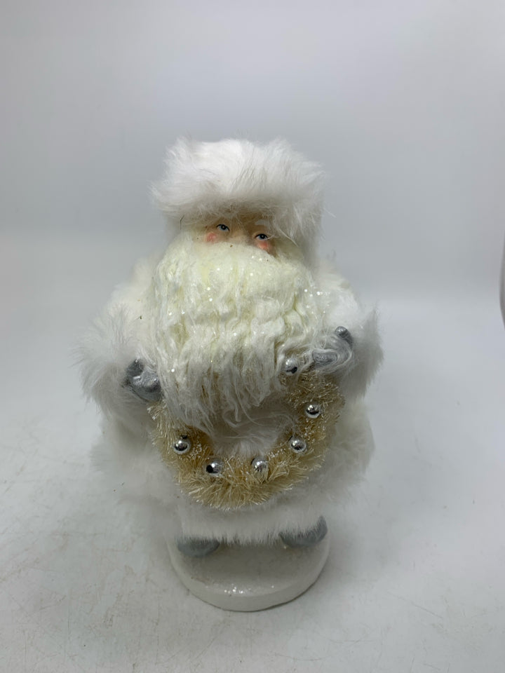 HEAVY SHORT IN ALL WHITE SANTA HOLDING WREATH ROBERT STANLEY.