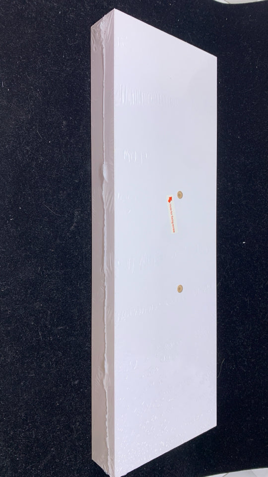 NIP WHITE FLOATING SHELF.