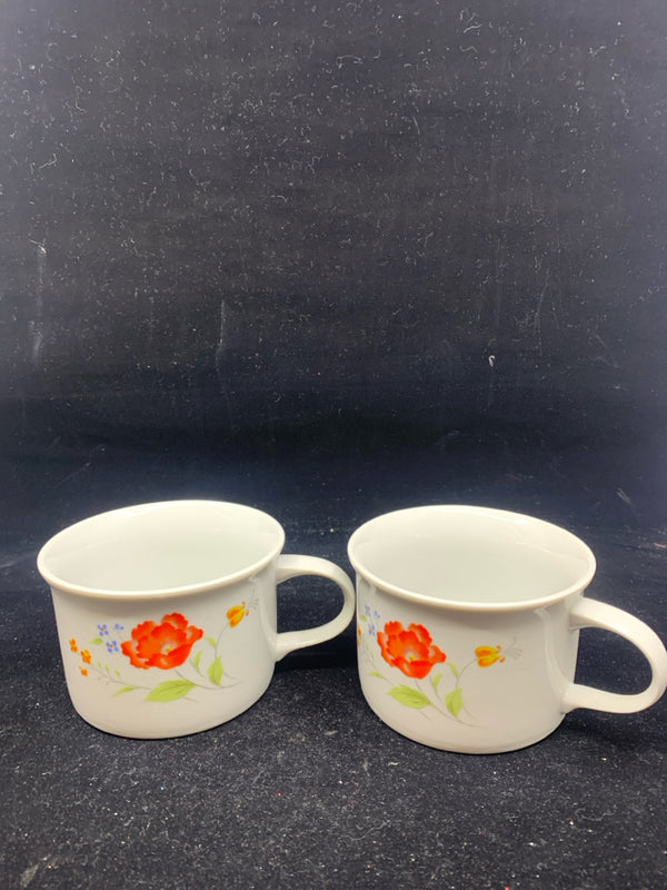 2 VTG ORANGE FLORAL MUGS.