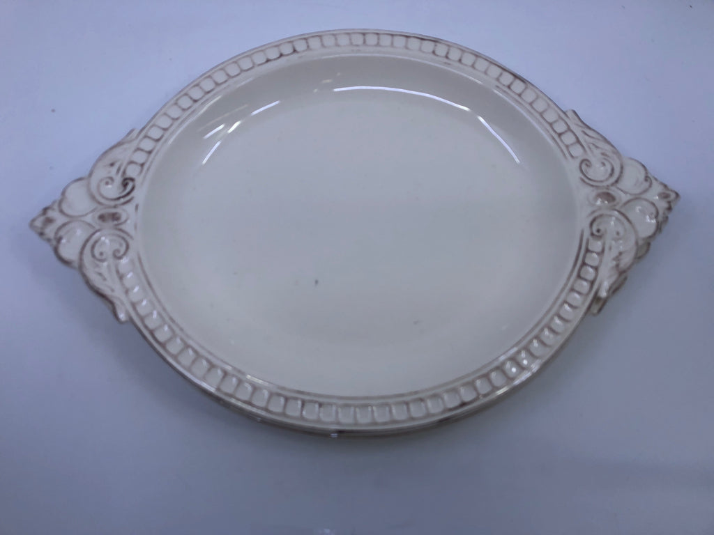 2 OVAL CREAM SCROLL DESIGN PLATTERS.