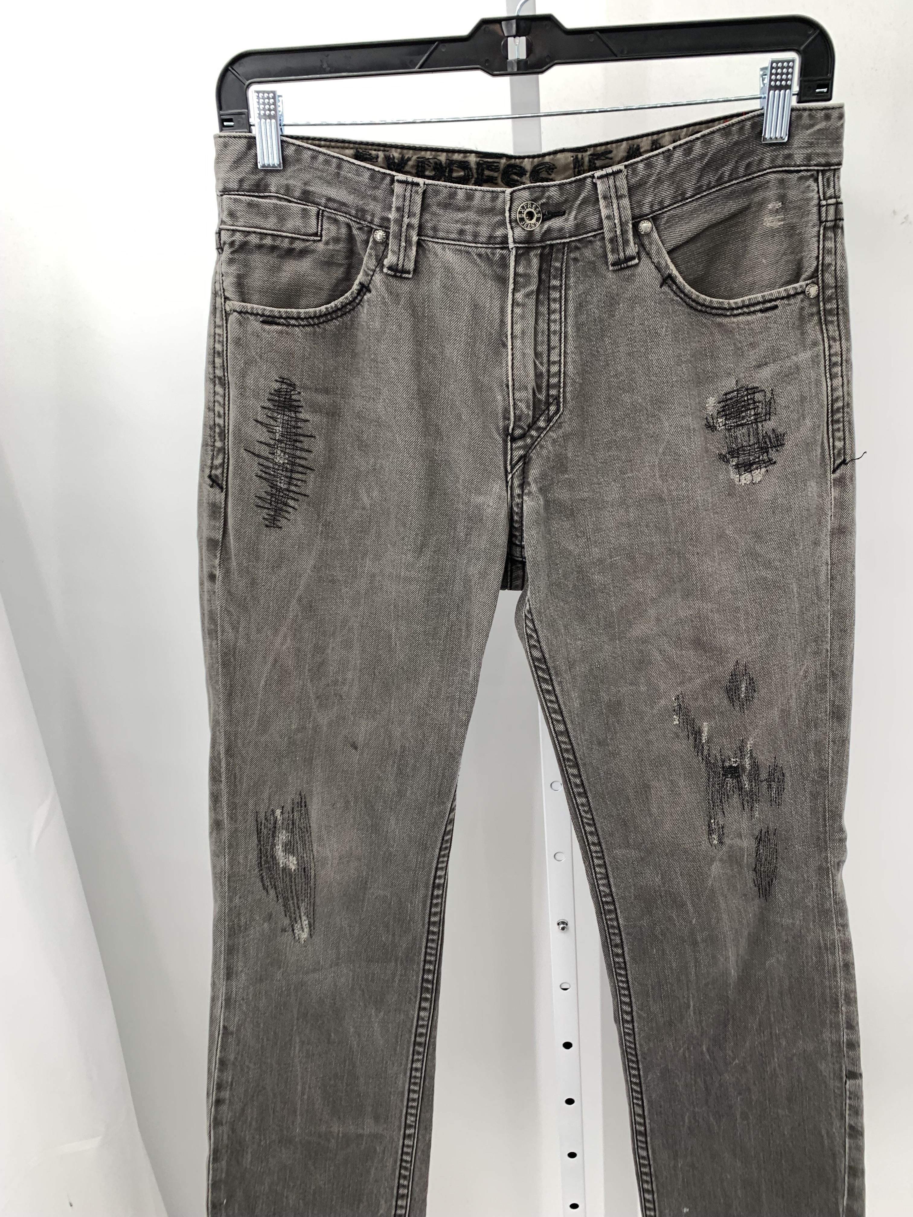 DISTRESSED DENIM JEANS