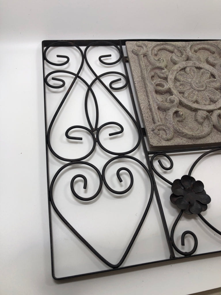METAL WALL DECOR W/CEMENT DECOR.