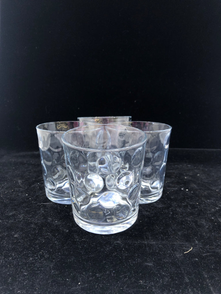4 SHORT CLEAR GLASSES W/ CIRCLE DESIGN.
