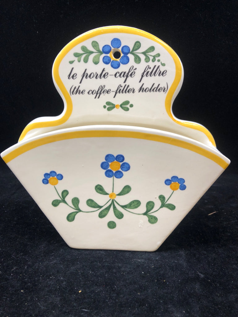 CERAMIC BLUE AND YELLOW COFFEE FILTER HOLDER.