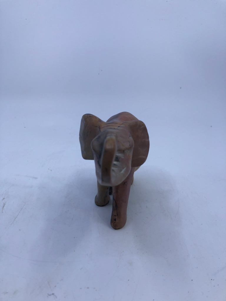 CARVED STONE ELEPHANT.