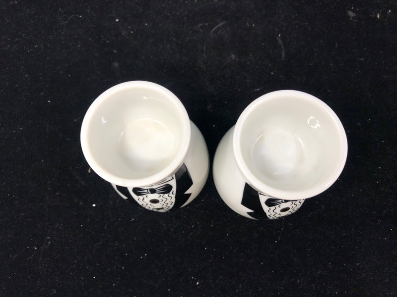 2 TUXEDO EGG CUPS.