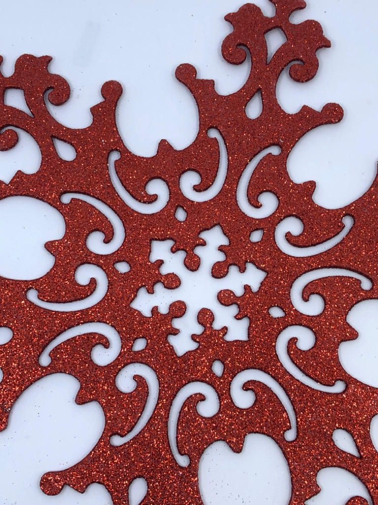 LARGE RED GLITTER SNOWFLAKE ORNAMENT.