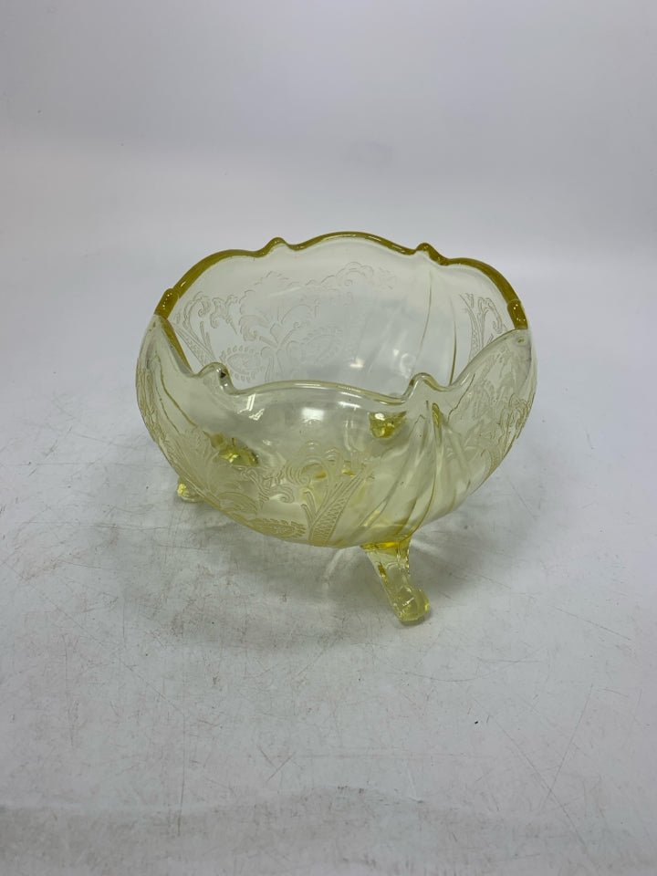VTG FOOTED YELLOW PRESSED DETAILS BOWL W/ UNEVEN EDGE.