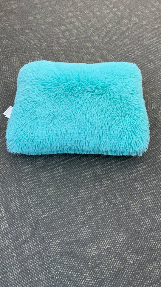 TEAL FURRY ACCENT PILLOW.