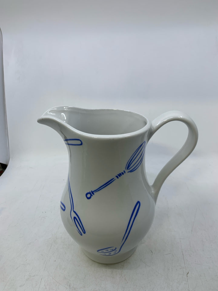 CERAMIC W/ ASSORTED BLUE UTENSILS.