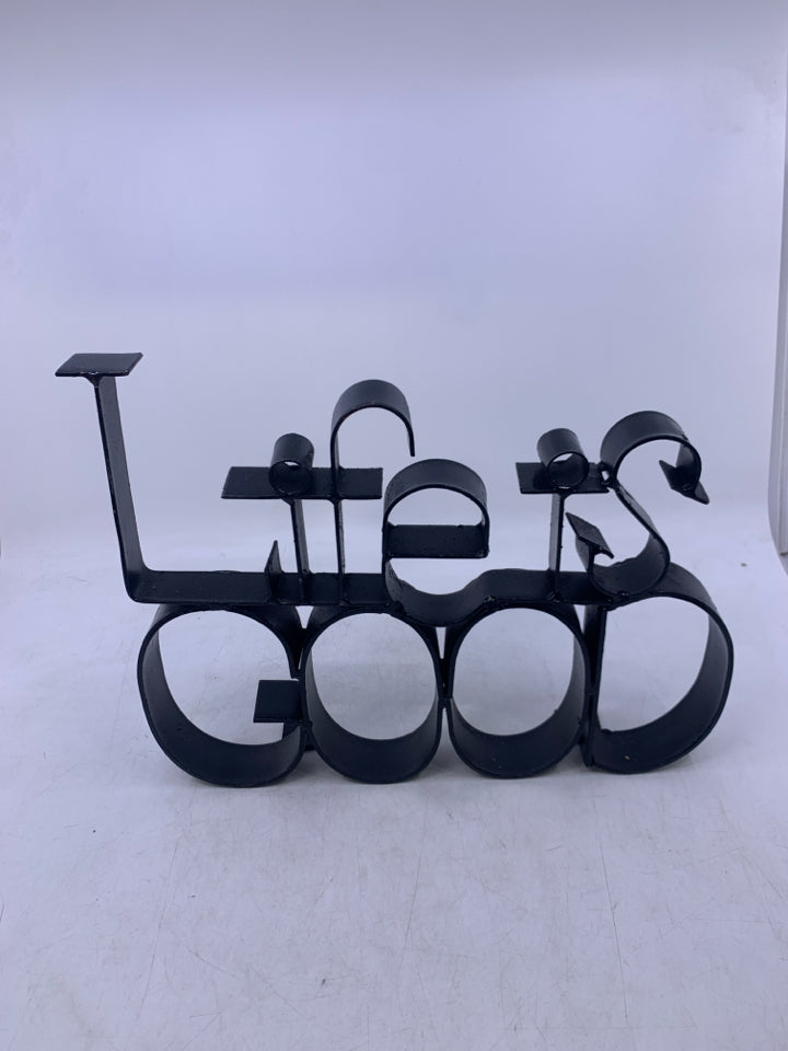BLACK METAL LIFE IS GOOD STANDING SIGN.