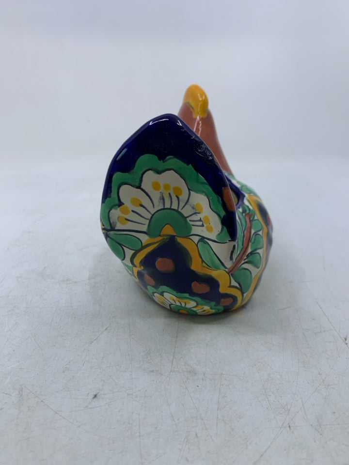 TERRA COTTA LAYING HEN W/ COLORFUL DESIGNS.