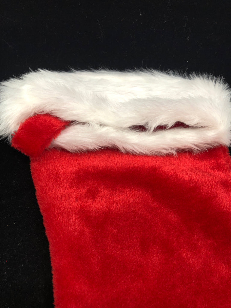 RED FUZZY FUR STOCKING.