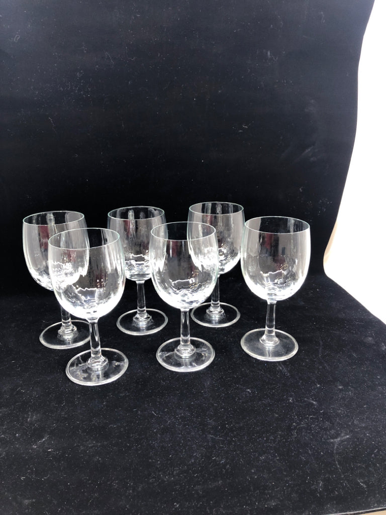 6 SLIGHT RIB WINE GLASSES.