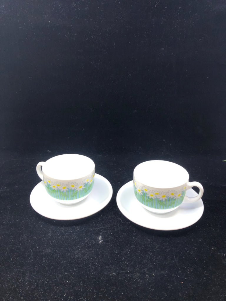 2 WHITE DAISIES TEA CUP AND SAUCERS.