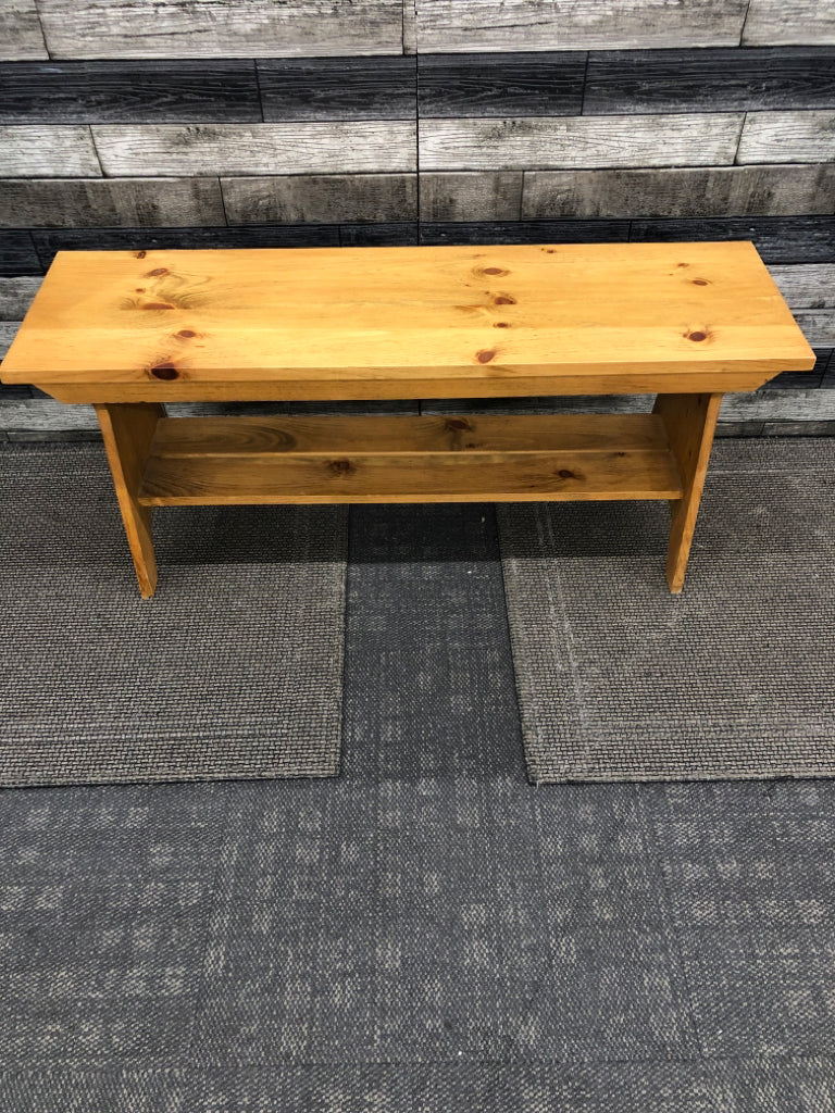 LIGHT WOOD BENCH W/SHOE SHELF.