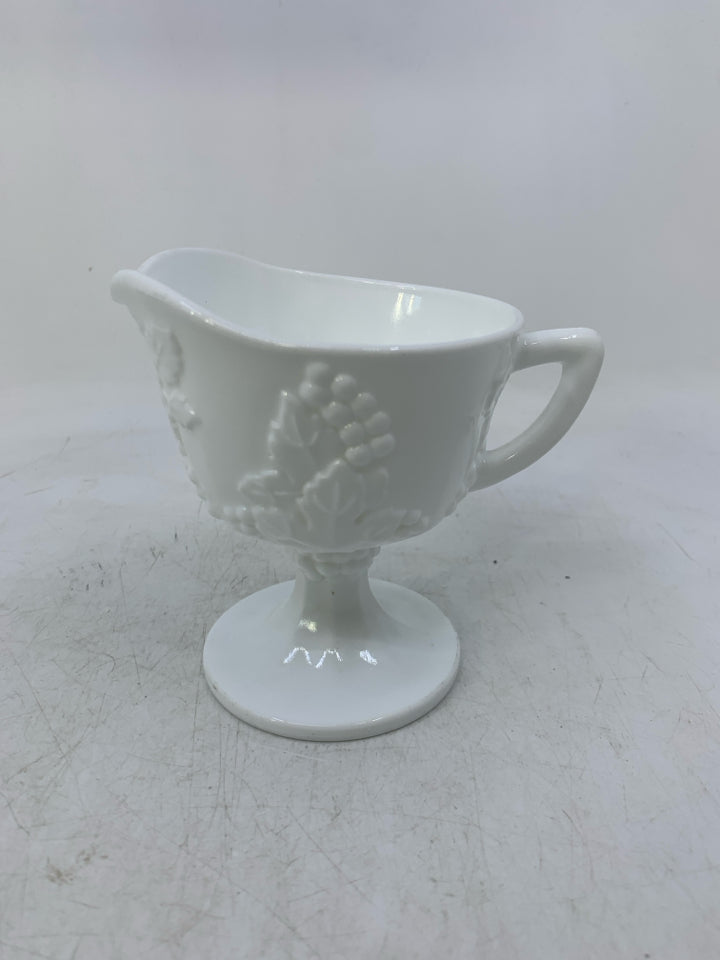 FOOTED WHITE GLASS EMBOSSED GRAPES.