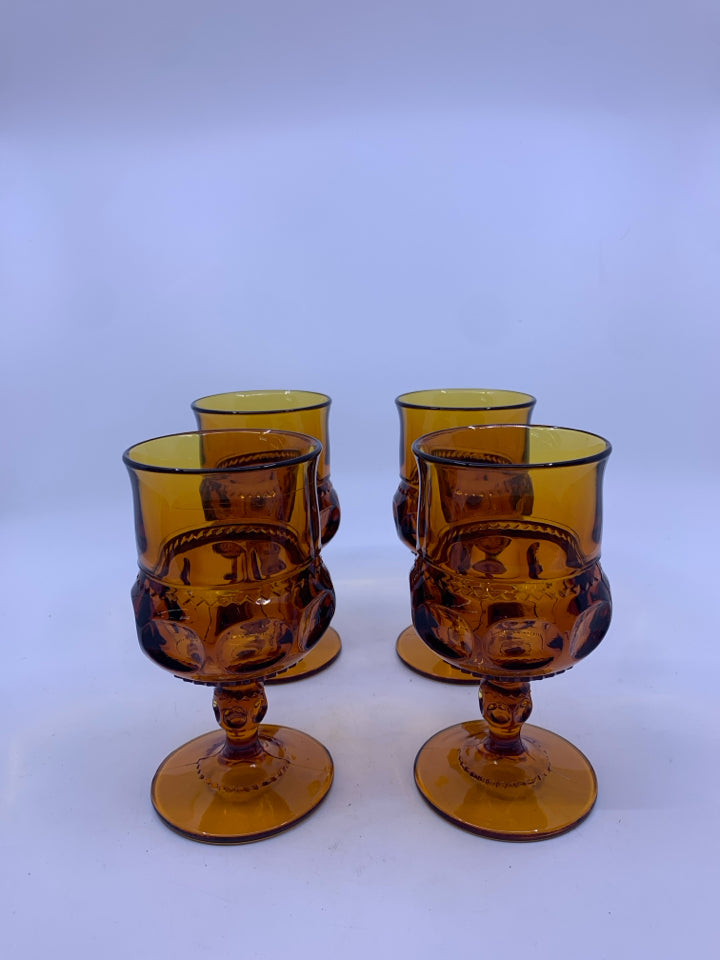 4 VTG AMBER GLASS GOBLETS.