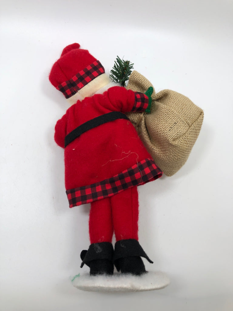 ANNALEE MINI SANTA IN ELF SHOES HOLDING CHRISTMAS SACK.
