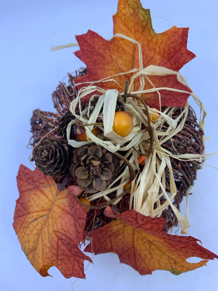 GLITTER TWIG PUMPKIN W/ PINECONES+LEAVES ON TOP.