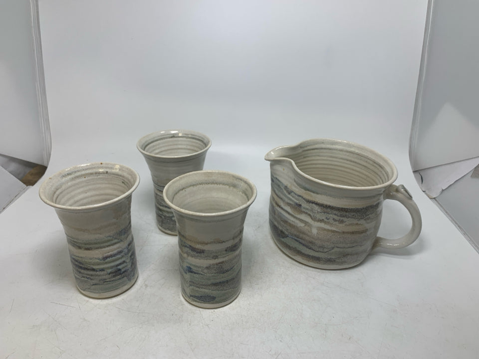 4 PC MULTI COLORED STRIPED POTTERY CUPS W/ PITCHER.