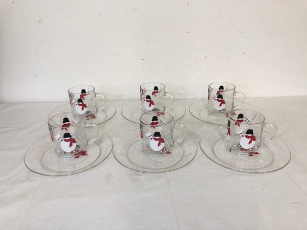 6 GLASS SNOWMAN CUPS + SAUCERS.