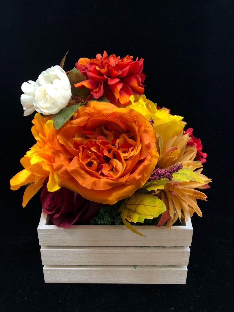 WHITE SLOTED PLANTER W/ FALL FLORAL ARRANGEMENT.