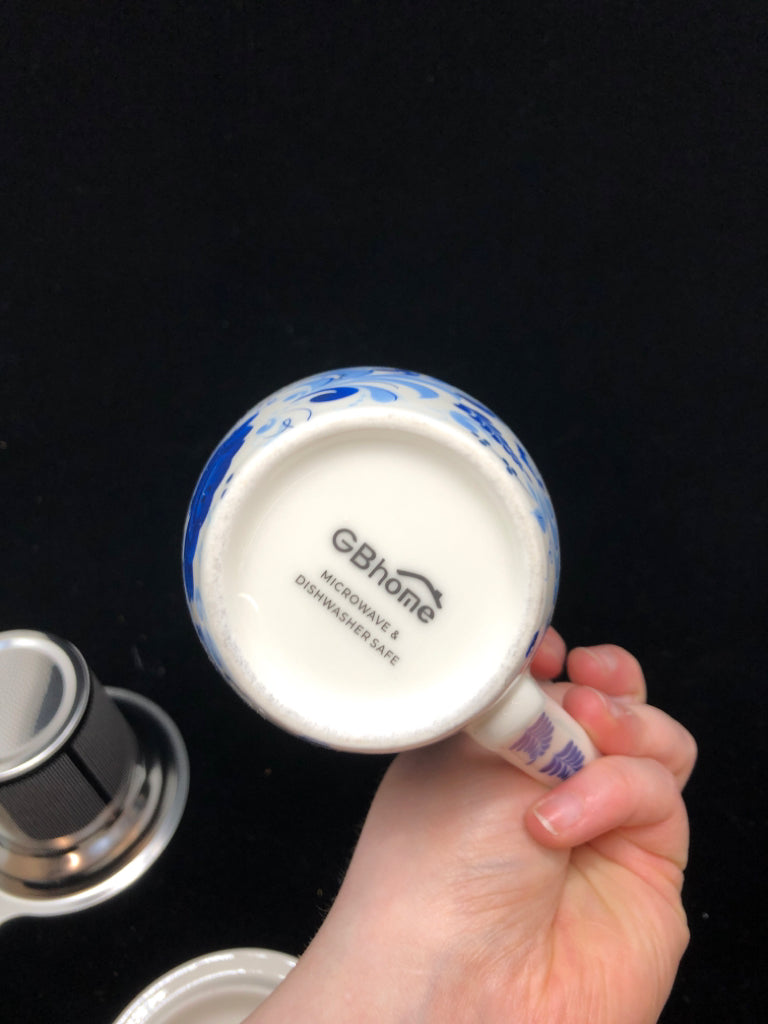 STEEPER MUG W/LID BLUE FLORAL ACCENTS.