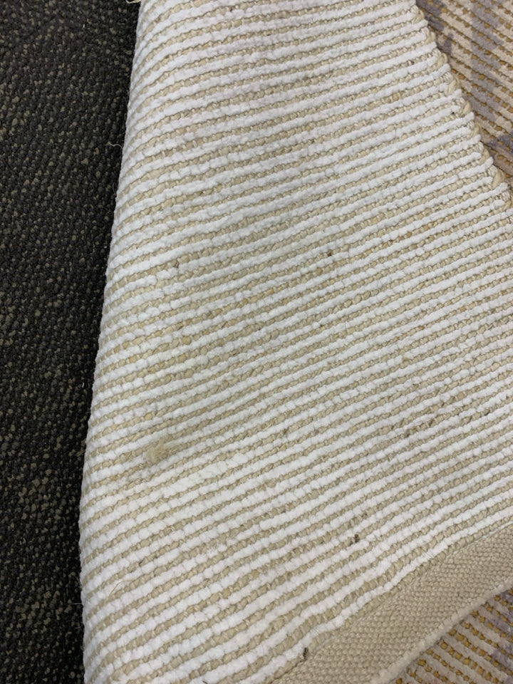 YELLOW STITCHED BEIGE & BLUE RUG.