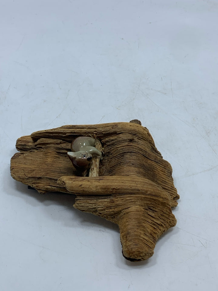 PORCELAIN KOALA ON RECLAIMED WOOD PIECE.
