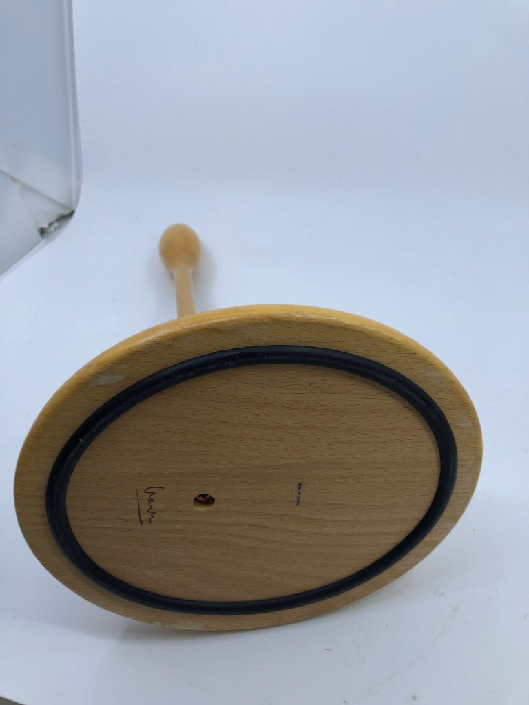 BLONDE WOOD PAPER TOWEL HOLDER.