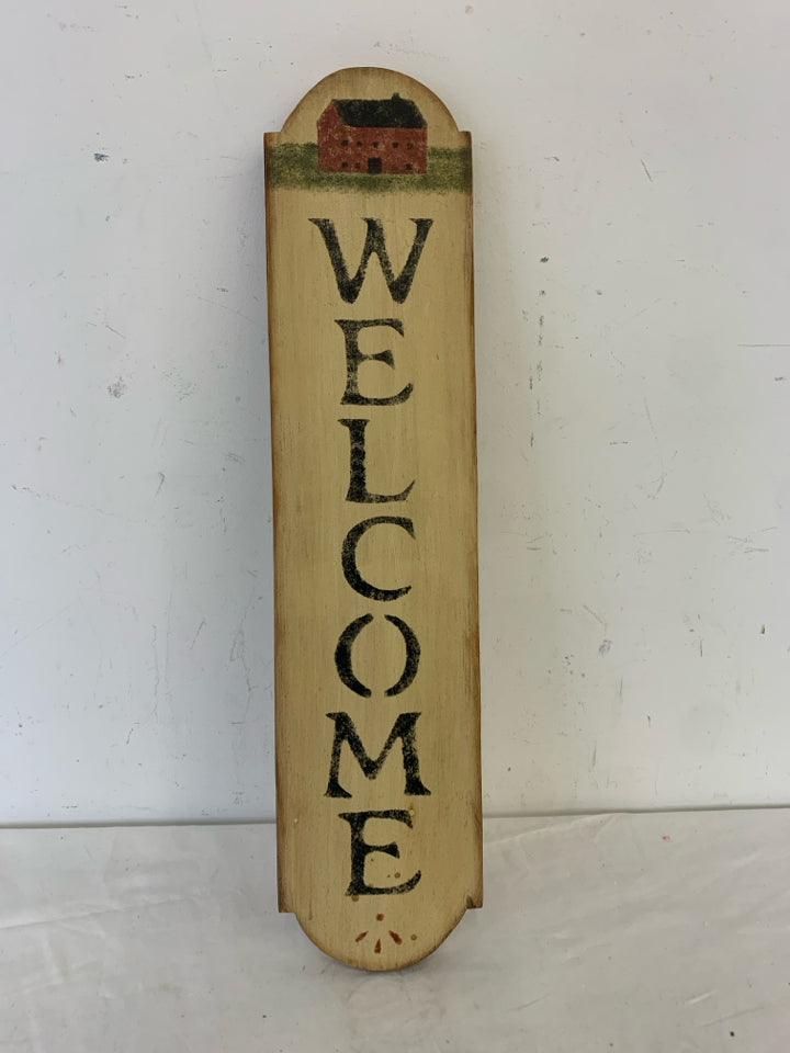 PRIMITIVE WELCOME SIGN.