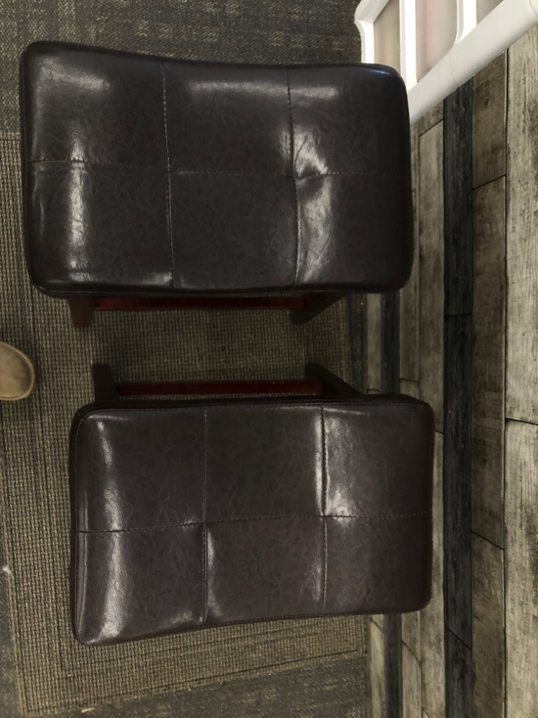 2 BROWN FAUX LEATHER STOOLS W/WOOD LEGS.