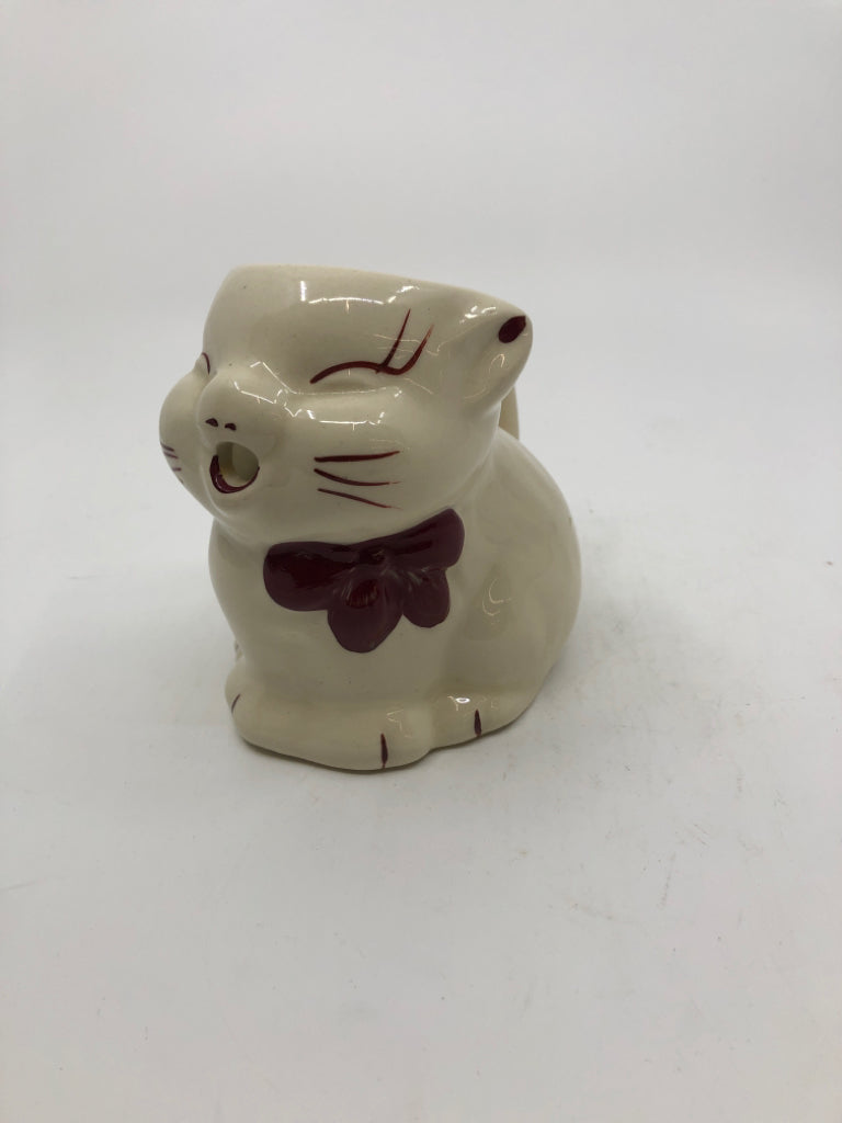 VTG CREAM CAT PITCHER W/ RED ACCENTS.