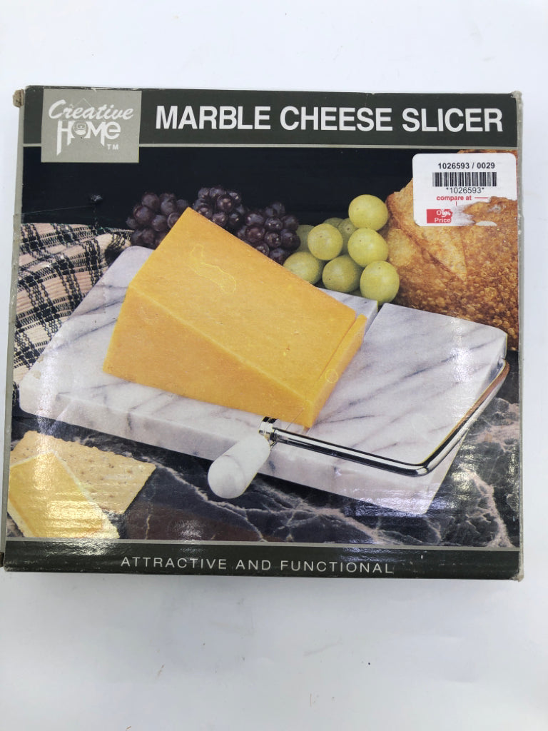 NIB MARBLE CHEESE SLICER.