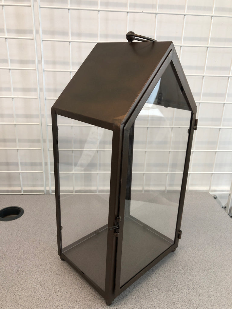 BRONZE PAINTED CANDLE LANTERN.