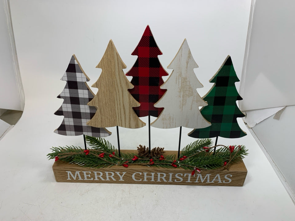 5 ASSORTED TREES ON STAND MERRY CHRISTMAS SIGN.