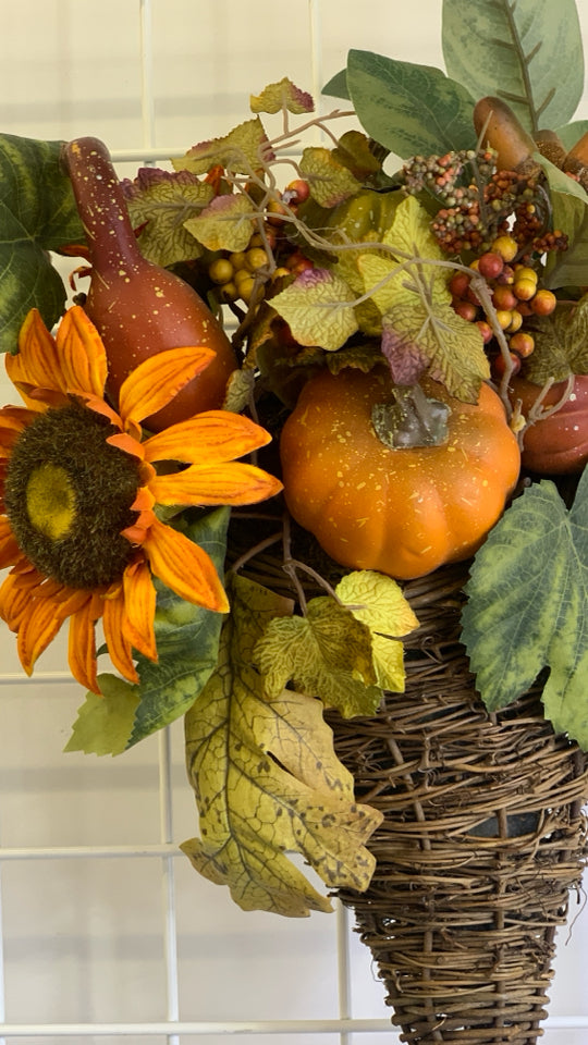 FAUX ORANGE CORNUCOPIA FLORAL ARRANGEMENT.