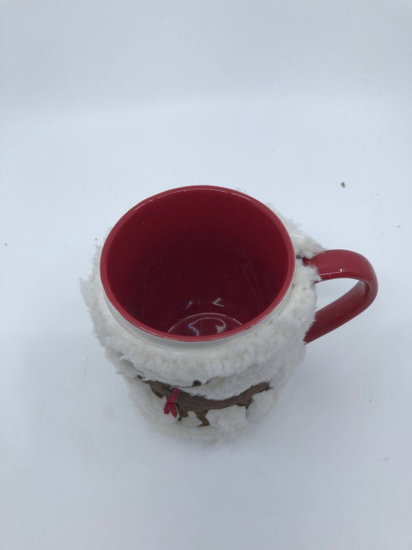 WHITE AND RED MUG W REINDEER SWEATER.