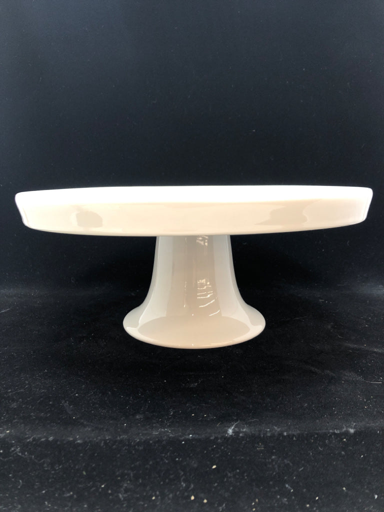 WHITE CERAMIC RAISED CAKE STAND.