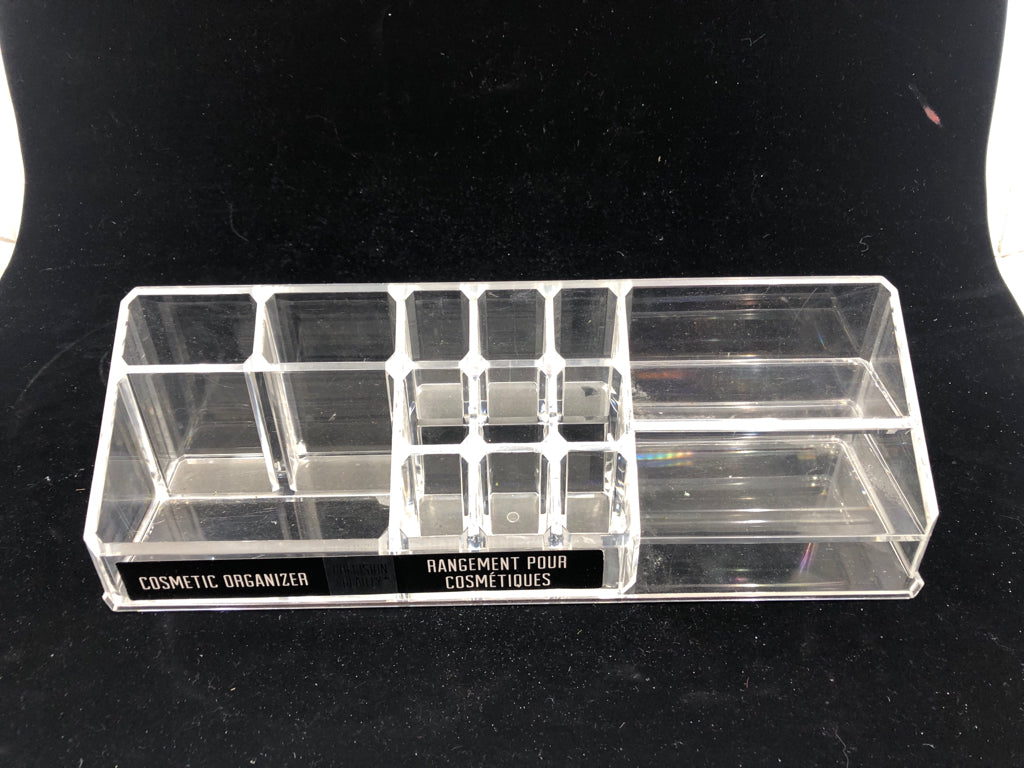 NIP CLEAR COSMETIC ORGANIZER.