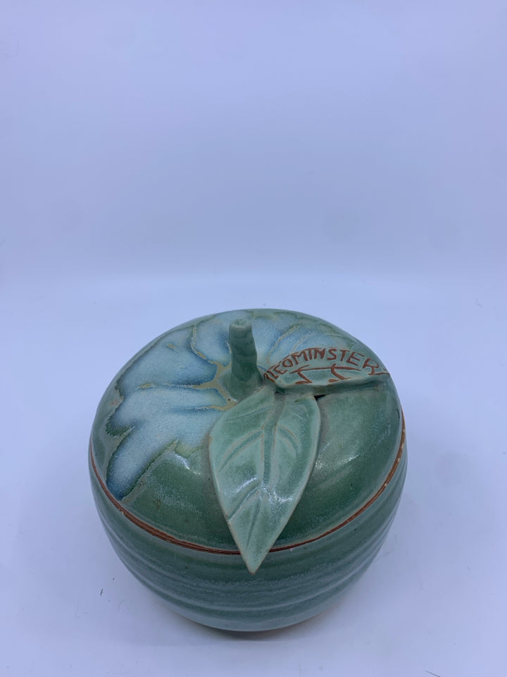 APPLE SHAPED POTTERY CANISTER W/ LEOMINSTER CARVED INTO LEAF.