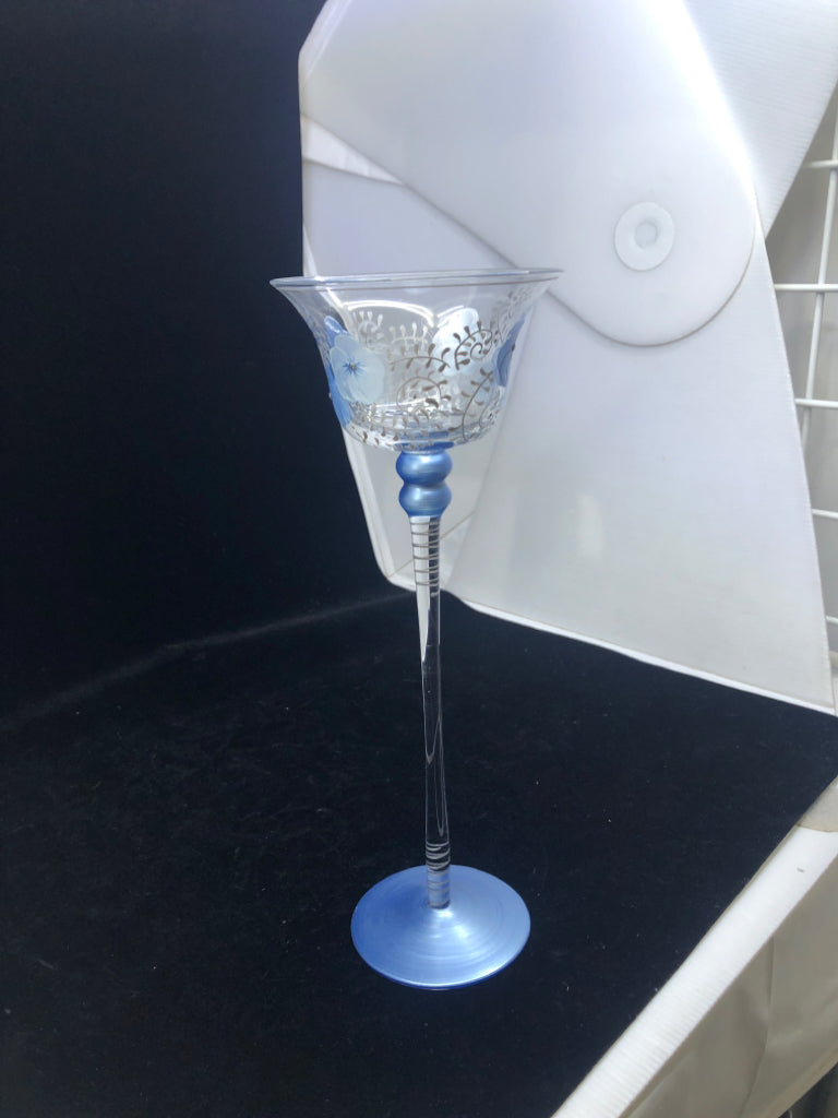 TALL GLASS VOTIVE CANDLE HOLDER BLUE FLORAL AND BLUE BASE.