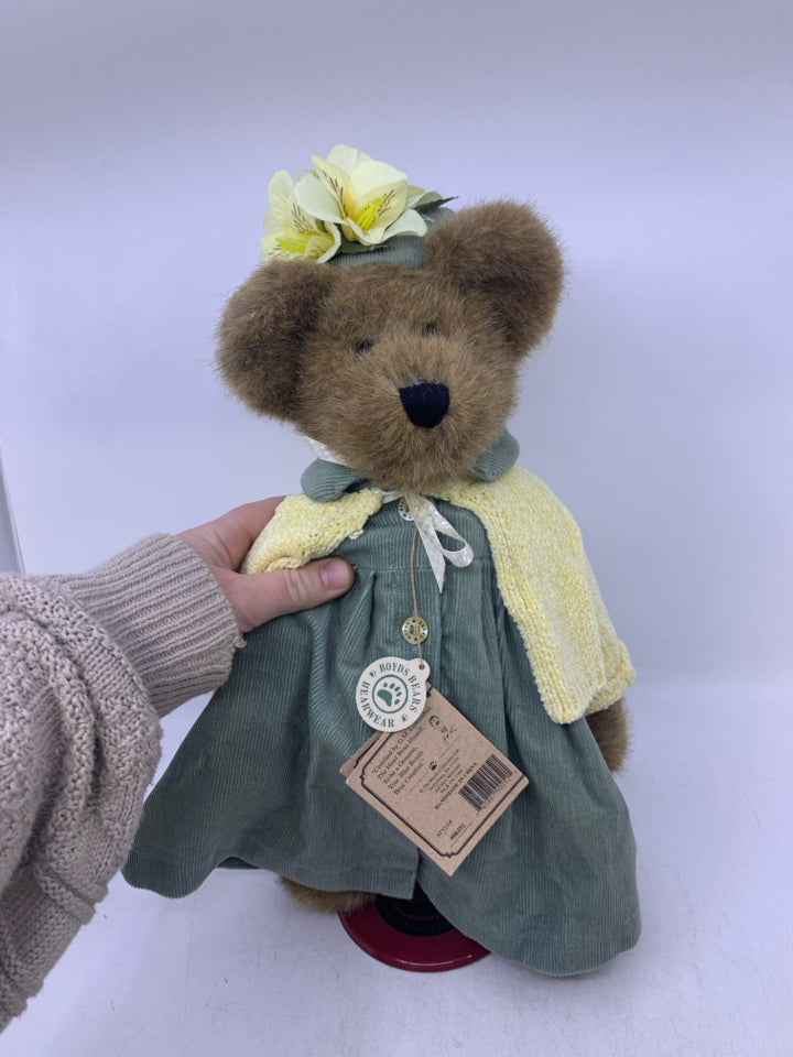 BROWN BEAR W/ LIGHT GREEN DRESS/HAT & YELLOW SHALL ON STAND BOYDS BEAR.