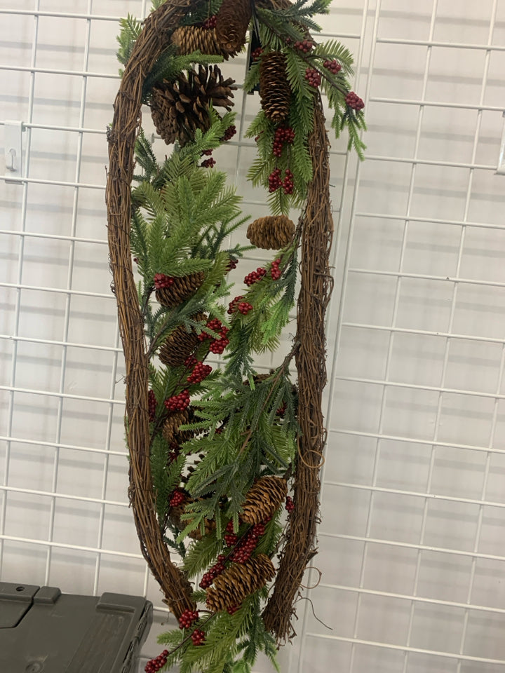 PINECONES AND RED PIP BERRY GARLAND.